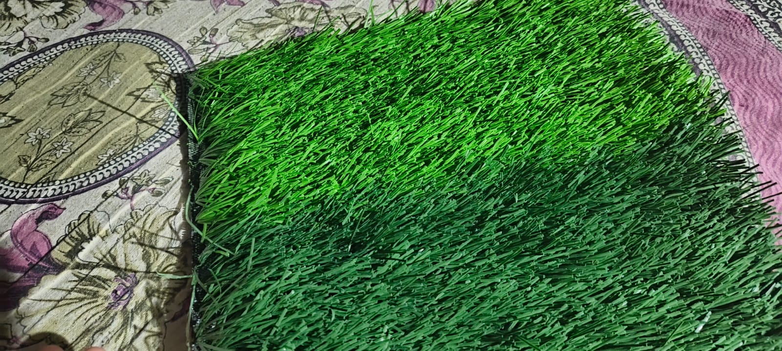 Lush green artificial grass sample