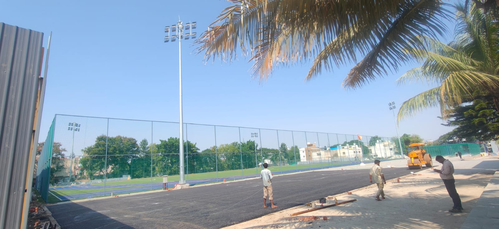 Tall boundary netting around a football ground